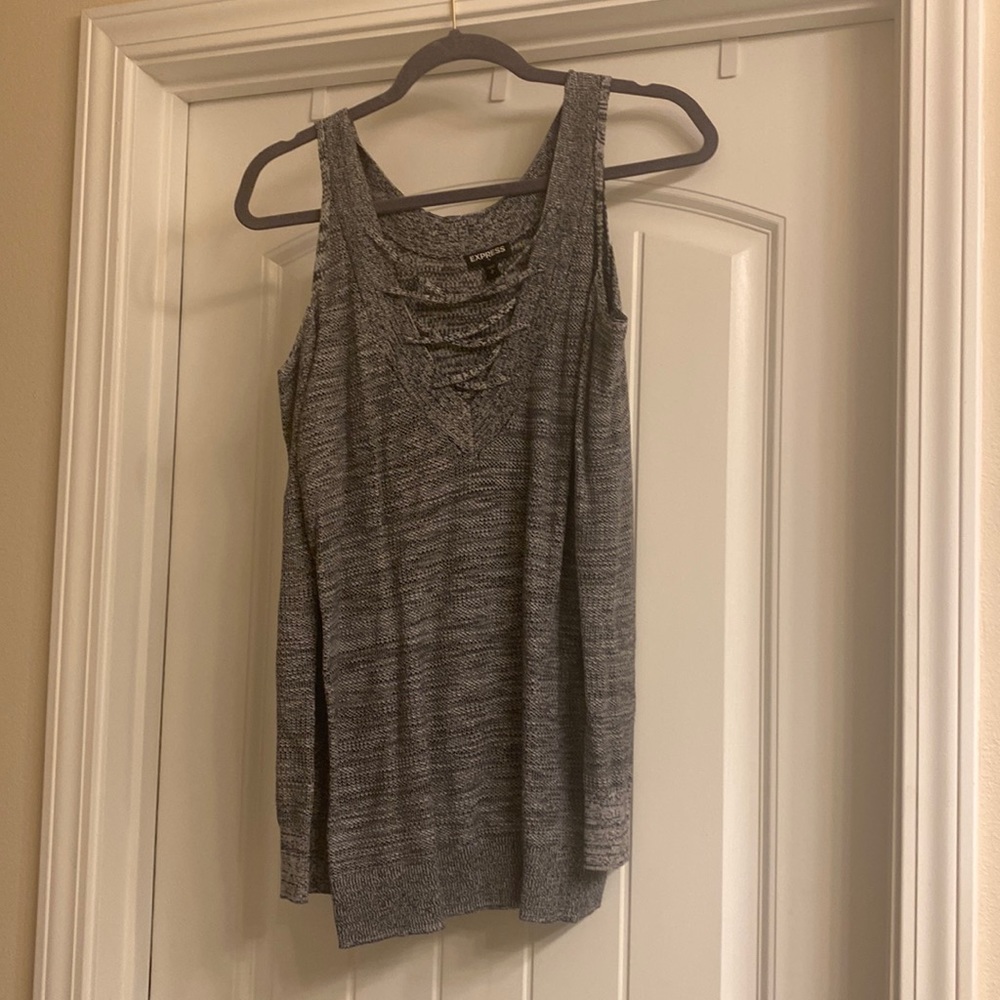 Express light sweater with open shoulders.